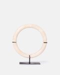 White marble rings on a base