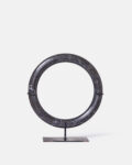 Black marble rings on a base